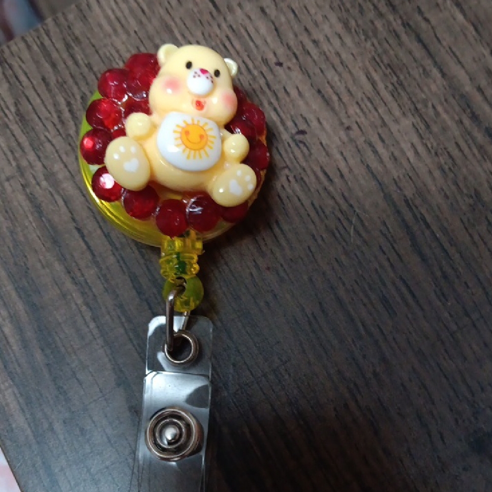 Yellow and Red Bear Badge Reel
